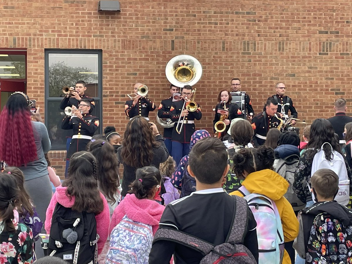 HarkinsEDU's tweet photo. To honor Month of the Military Child, we were treated with a visit by the Marine Corps Brass Band Ensemble!  As students arrived, they were greeted by these amazing musicians. It was a great way to start the day! Thank you to @LillieGJessie43 for stopping by as well. @PWCSNews https://t.co/ykef42MtDy