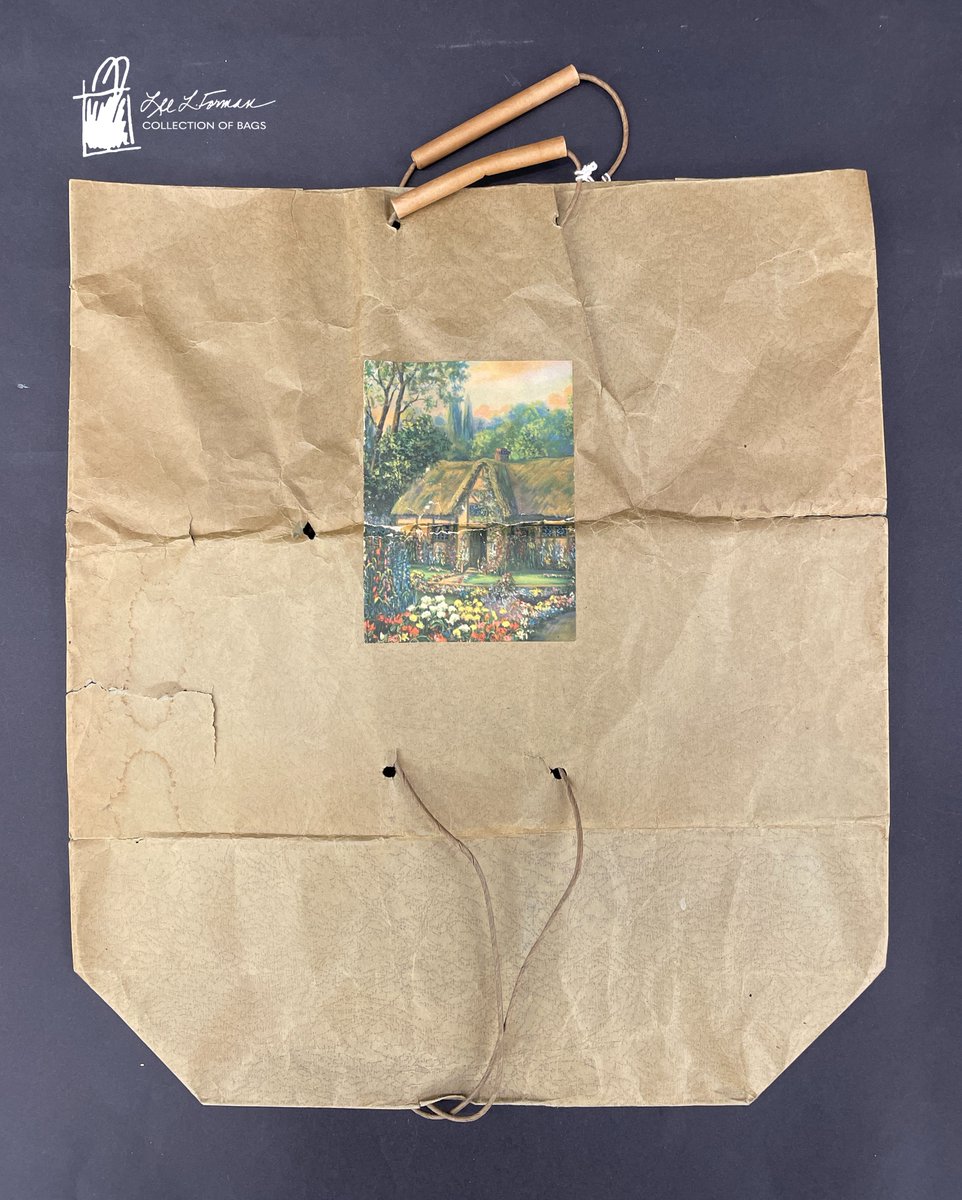 116/365: One of the earliest handled paper bags for consumers was patented by Walter Deubener of St. Paul, Minnesota on May 27, 1929. Strings exit the bottom of the bag and extend around the exterior of the base to reinforce the weight of the contents.