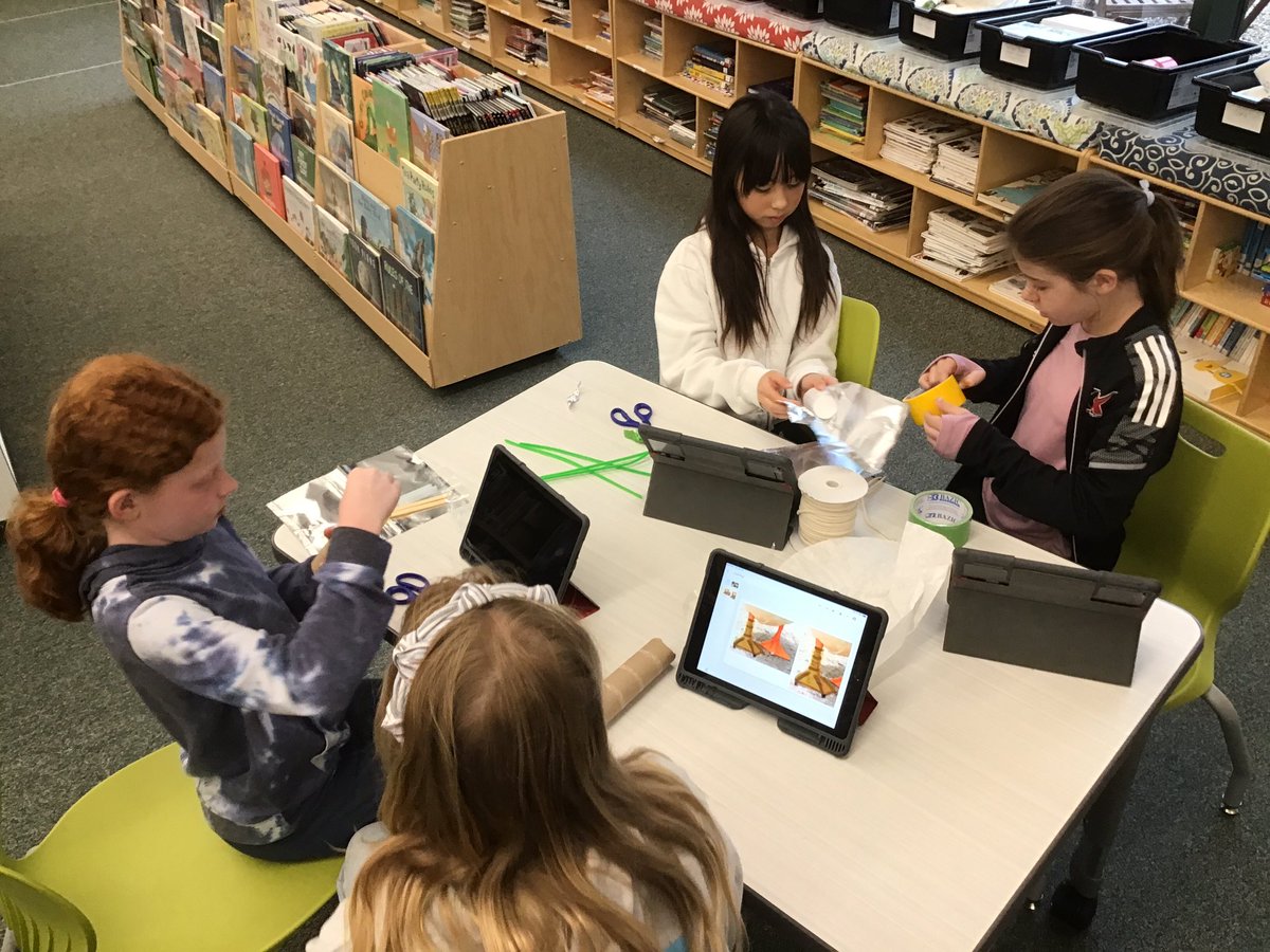NBSLibrary's tweet photo. Engineering with empathy.  After reading Not So Different, Winter’s Tail, and Beauty and the Beak, these 5th graders are building animal aide prototypes. @nbes220 #ColtPride #SeeTheStudent https://t.co/0hsJ0LQ2bC