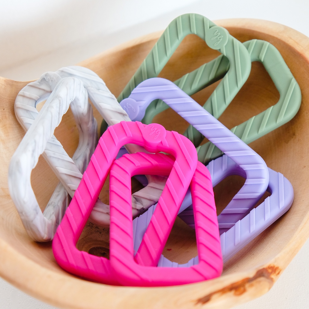 BooginHead's tweet photo. Not every baby needs a pacifier clip but every baby does need a teether - and we are so excited to show you our NEW interlocked Silicone Chain Link Teething Rings! 
#booginhead #babyootd #babyfashion #babyteether #cutebaby #momlife #motherhood 

https://t.co/rKt58DkAJT https://t.co/pduRgKdUgK