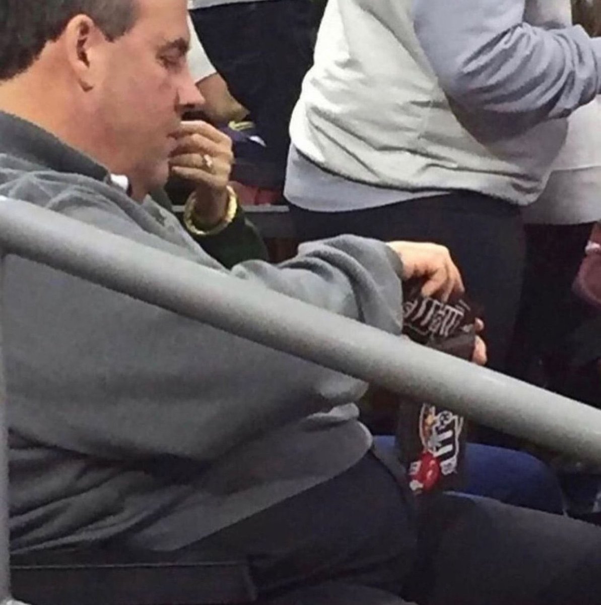 Gov. Chris Christie pours a small bag of M&amp;Ms into a bigger bag of M&amp;Ms. (2016)