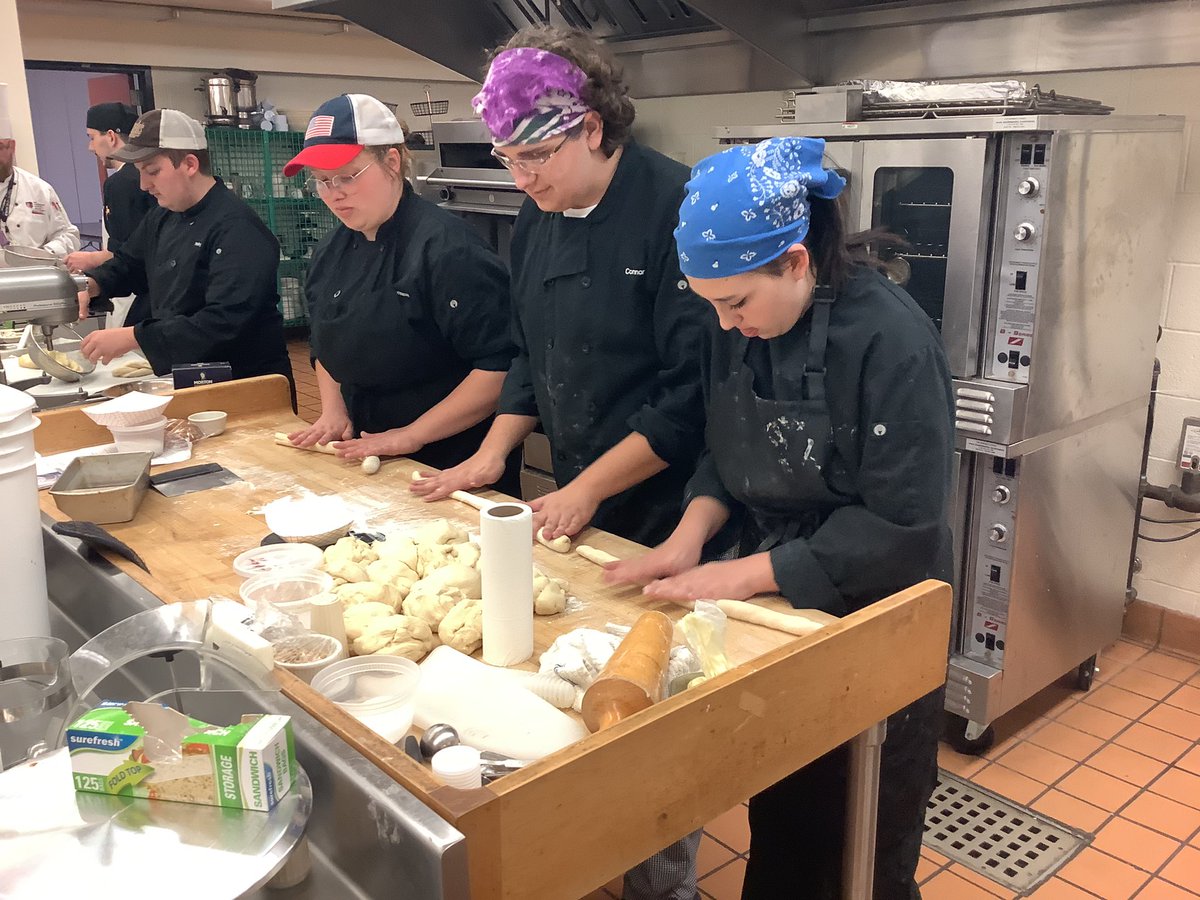 WesternAreaCTC's tweet photo. It’s National 🥨 Day!  Check out our pretzel assembly line in Culinary Arts!  To truly test our students skills we challenged them to make mascarpone filled pretzels and they turned out delicious!  Well done everyone 👍🇮🇹🇩🇪 #NationalPretzelDay https://t.co/Q26yVcKYgP