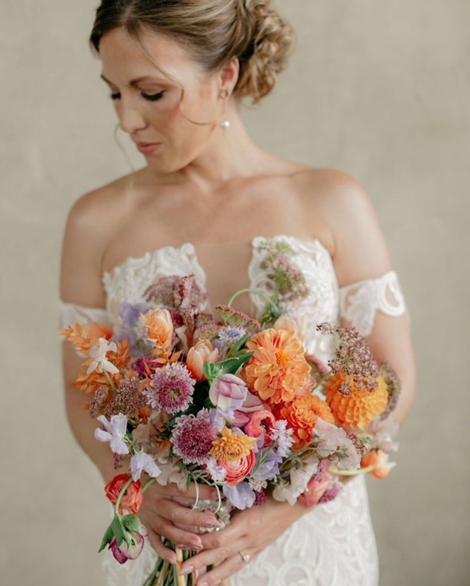 File under: stunning spring bridal bouquet! An arrangement of dahlias, scabiosa, ranunculus, tulips &amp; sweet pea in shades of pink, peach &amp; purple🌸
Designer: @jessicadankenbrink
Floral Designers: @brooke_from_scratch &amp; <a href="/__elisse__/">Elise</a>
Photographer: @michellescottphoto
#BoldEventsATL