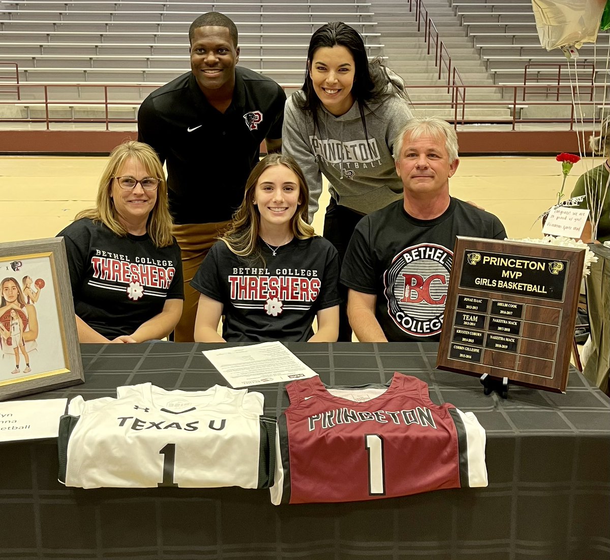 Kaitlyn McKenna signed to play basketball for Bethel College in North Newton, Kan., an NAIA school in the Kansas Collegiate Athletic Conference. She was joined by her parents, Michelle and Bill McKenna, and coaches Carla Denning and Dennis Webb.