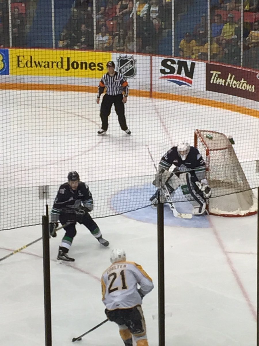 PJ_Coward's tweet photo. Last time in Brandon was to watch our billet @LandonBow play in 2016 WHL final with @SeattleTbirds Today was extra special to watch my son same rink, same net and couple of the same coaches, pull off a @Rebelshockey game 3 first round win and gets ⭐️⭐️#prouddad https://t.co/UWUk5gciLo