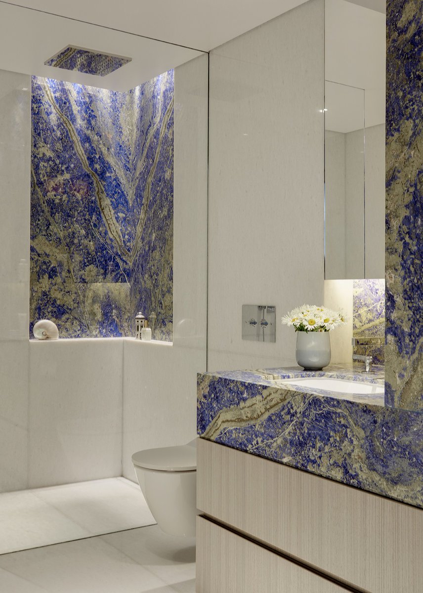 #Bathrooms have transitioned from functional #spaces to sanctuaries of #relaxation and #wellness. Bathrooms respond well to #light, and it is essential to make the most of finishes like this #unique and #exotic #marble. 

Design Team: @<a href="/studioindigoltd/">Studio Indigo</a>
Photography: Luke White