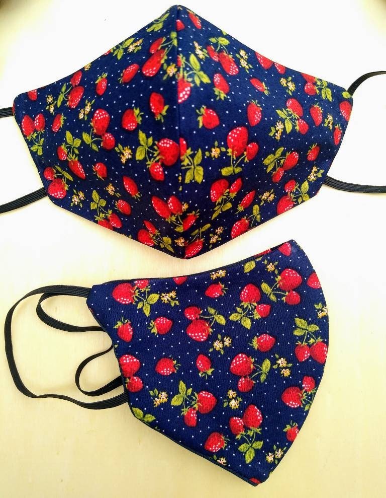 TTabbyshack's tweet image. Handmade 3 layer cotton fitted facemask in gorgeous Navy Strawberry print, with opening for filter insert and soft navy cotton lining. #etsy #reusablemask #facemask #mhhsbd etsy.me/37O4h6D