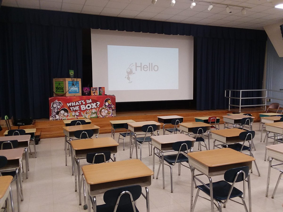 djudemiller's tweet photo. All set up at #GreaterPlainsElementary. Some kids think that I'm a magician for some reason? One student thought that I was going to put someone in the box and cut them in half. Hmm, maybe next time! :-) #childrensbooks #virtualauthorvisits #teacherlife #authorvisit #librarian https://t.co/rqF1c4PSRk