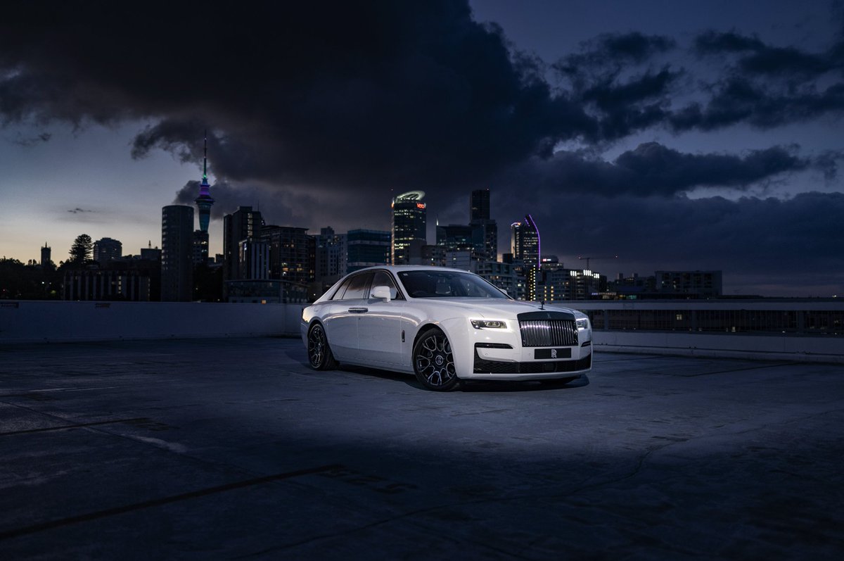 rollsroycecars's tweet photo. #BlackBadge #Ghost emerges from the evening shadows of Auckland, New Zealand.

#BlackBadgeGhost https://t.co/S7lAen5HCL