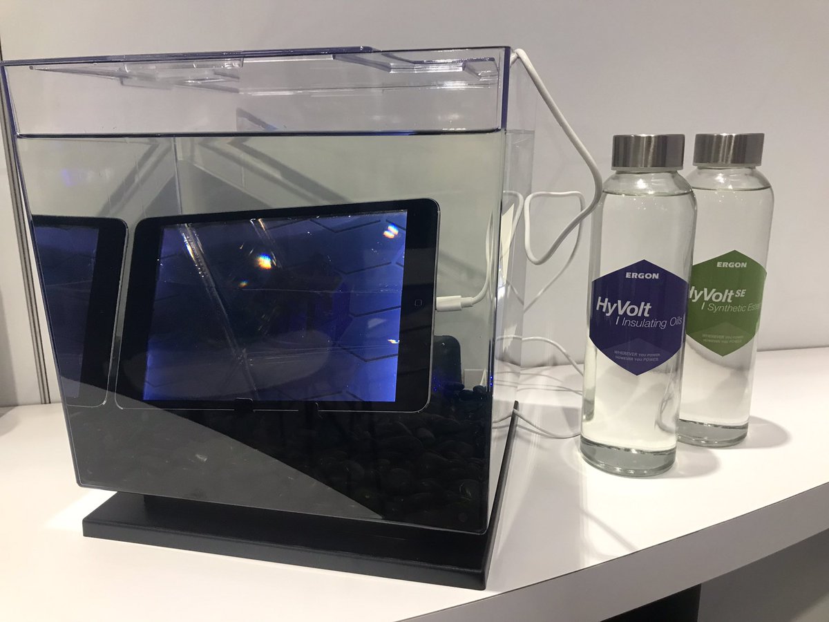 ErgonOils's tweet photo. This iPad operating in HyVolt in Ergon’s booth at #IEEE2022 is a real-world example of what dielectric fluids do every day. Immersion fluids offer increased performance &amp; cost-saving benefits cooling high-powered data centers. #HyVolt #dielectricfluid #transformeroil https://t.co/P0hGIFZi5G