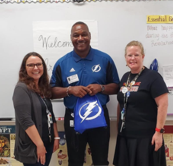 HillsboroughSch's tweet photo. Who's our favorite player? 
Mr. @DBrooks55! 
Brooks visited @FarnellHCPS to recognize teachers Jennifer Alvarado &amp; Patricia Vanderwest for their work with the 306 Black History Program sponsored by Derrick Brooks and the @TBLightning. Thank you for speaking with our 6th graders! https://t.co/bIwiCsUrP2