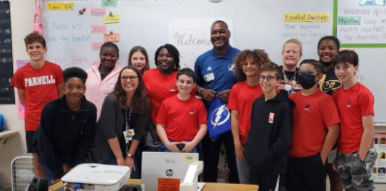 HillsboroughSch's tweet photo. Who's our favorite player? 
Mr. @DBrooks55! 
Brooks visited @FarnellHCPS to recognize teachers Jennifer Alvarado &amp; Patricia Vanderwest for their work with the 306 Black History Program sponsored by Derrick Brooks and the @TBLightning. Thank you for speaking with our 6th graders! https://t.co/bIwiCsUrP2