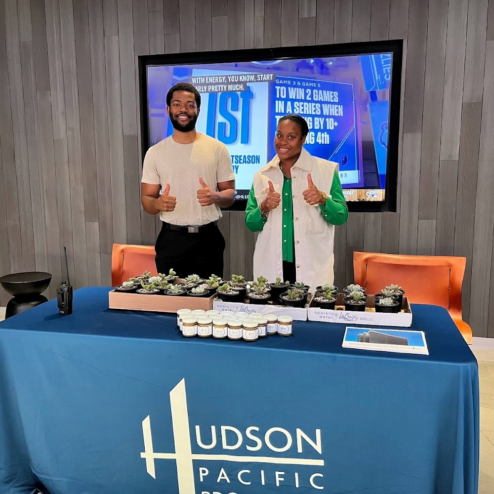 VictorColeman's tweet photo. A sweet way to start the day! This morning, our Property Management team greeted Hudson Pacific employees and tenants at 11601 Wilshire with free succulents and honey collected from our rooftop beehives. Awesome work - and thanks for the picture Michael and Alexis! https://t.co/L7vfM4hjGk