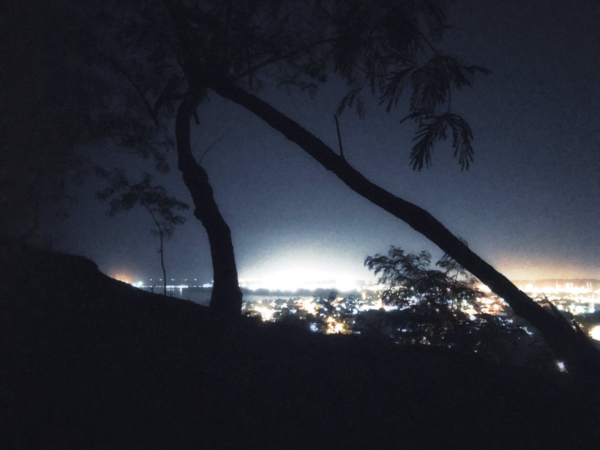 View of Naparima Valley from #SanFernando hill. Taken just before sunrise. . . . #horizon #landmark #NightPhotography #streetphotography #lumibee #tree #night #silhouette #cityscape #city #citynight #TrinidadandTobago #NatureBeauty #blackandwhitephotography #IslandLife #travel