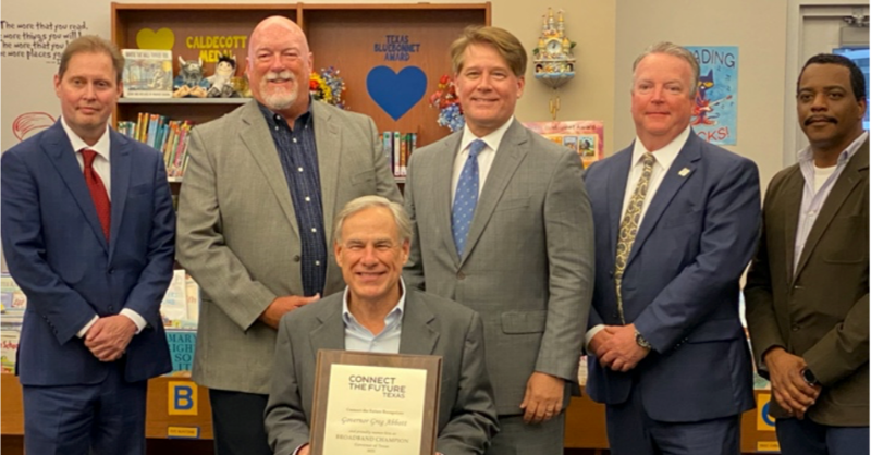 CTF_TX's tweet photo. We're grateful for @GovAbbott’s ongoing efforts to deliver reliable internet to unserved Texans. That’s why we presented him with a CTF Broadband Champion Award.
