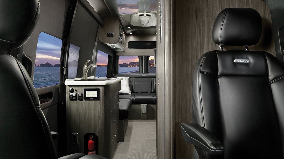 MBvansUSA's tweet photo. Whether you're on the road or enjoying your destination, a kitchen, a bathroom, sleeping space, lounging space, and more make it feel like home in the Interstate 19 from @Airstream_Inc #RVPartner https://t.co/ulqOJJE1sZ