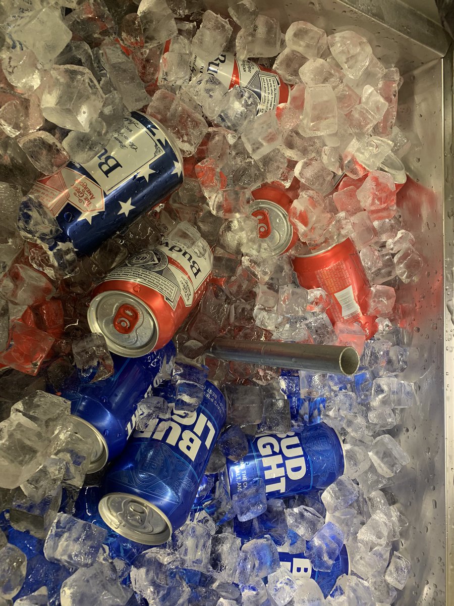 In their natural habitat- ice bath! $5 ice cold Bud and Bud Light!