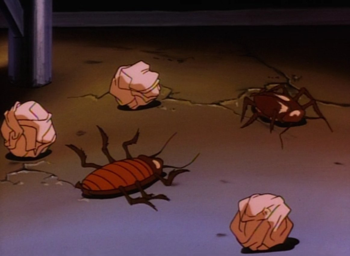 The "little friends": some cockroaches that Hyena has been shooting paper balls at with an ersatz slingshot.