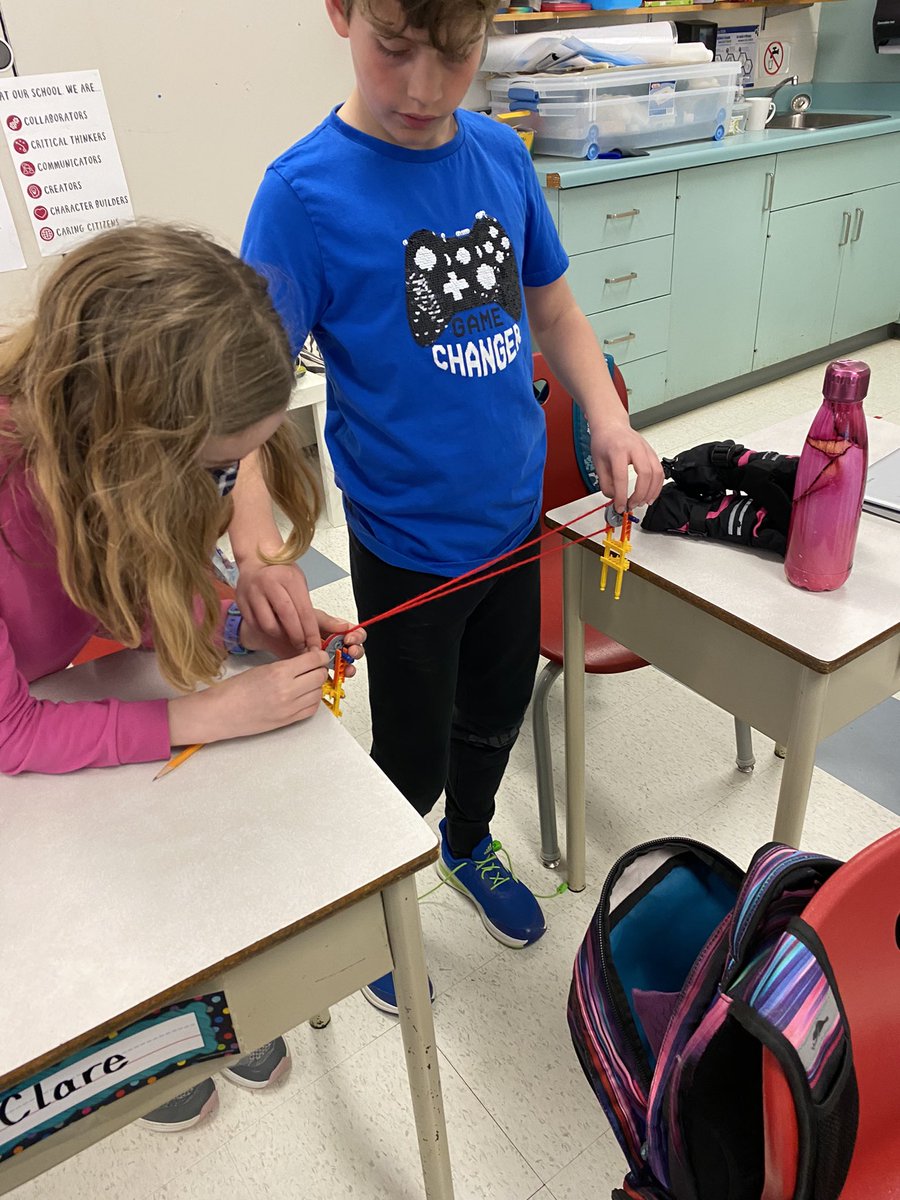 MrsAitken7's tweet photo. We love simple machines! Such a fun way to start our last science unit! Trying to build pulley and gear systems. #science #STEM @HolySpiritOCSB https://t.co/yv2AFpKNLQ