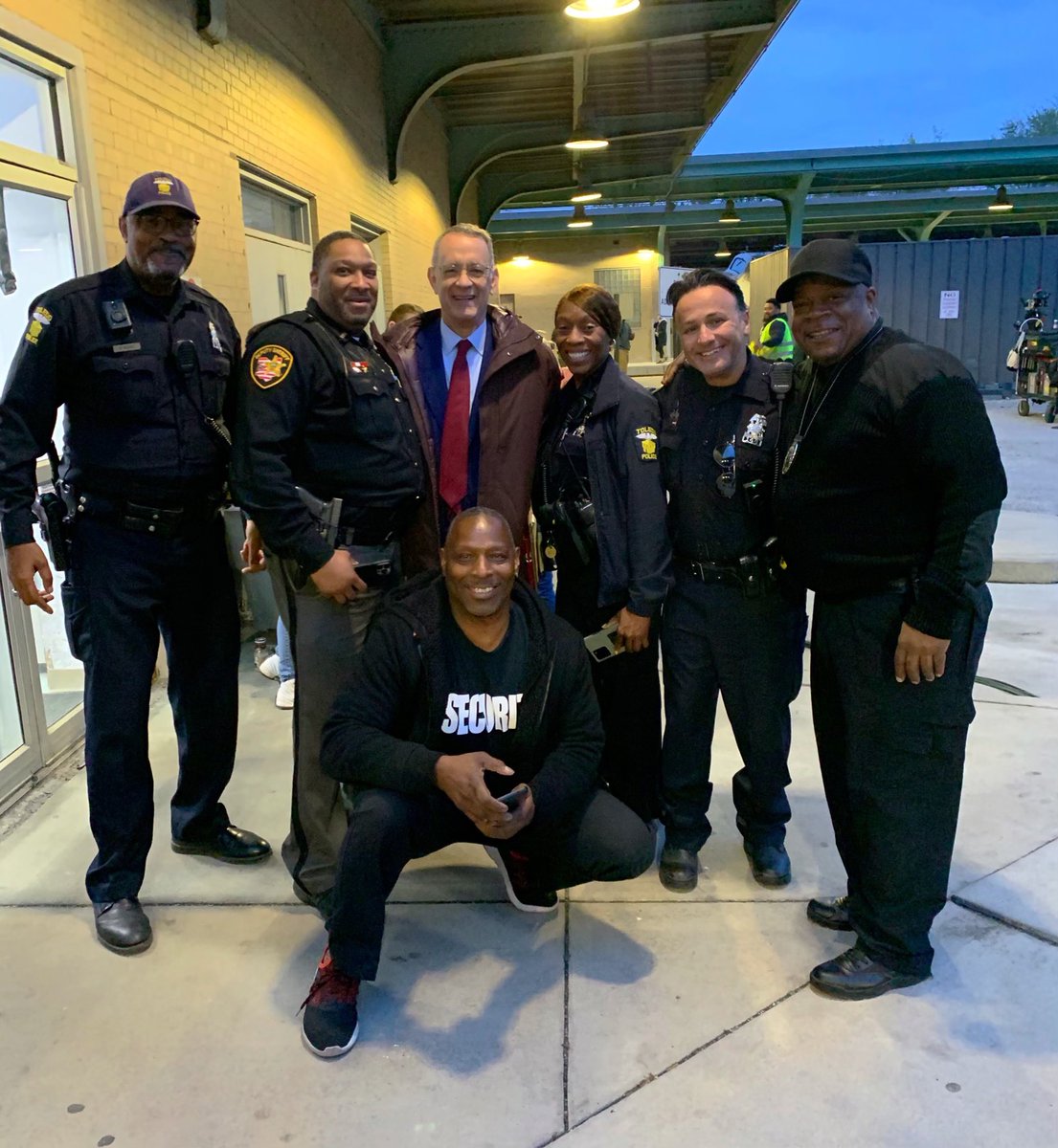13abc's tweet photo. Tom Hanks is filming an upcoming movie in Toledo! 🤩 He posed for a photo with TPD officers. https://t.co/Oft1iY7mty