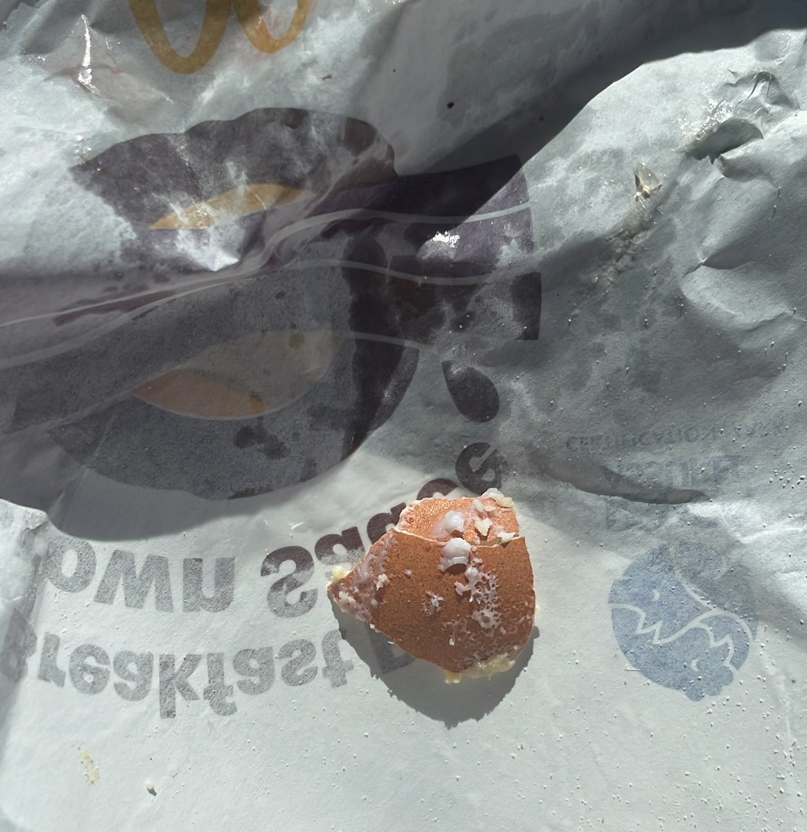 Mellyybum's tweet photo. Surprise eggshell in my breakfast roll 😟 @McDonaldsUK https://t.co/D1SiJbv4KA