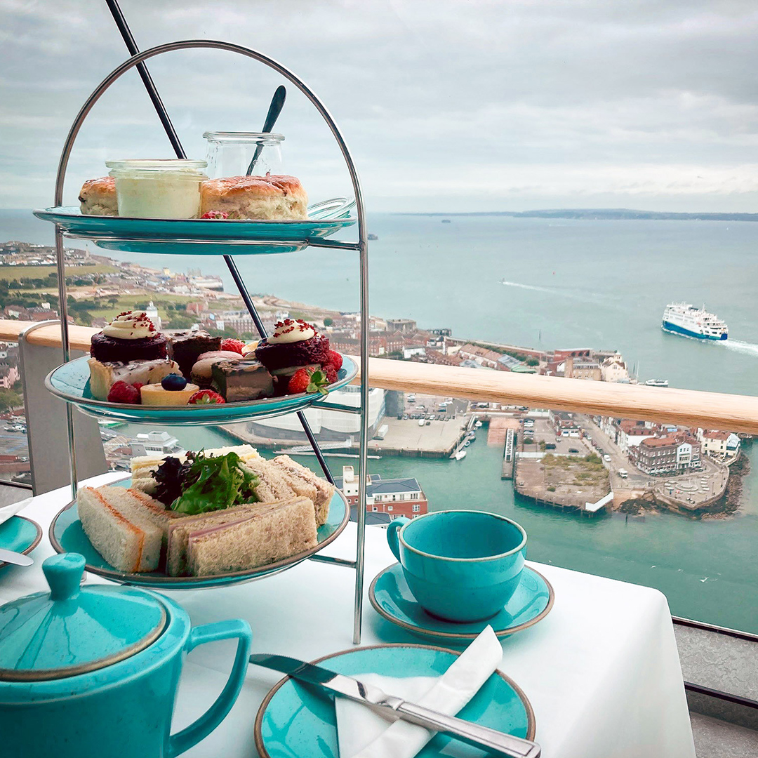 Enjoy a delicious treat with uplifting views - High Tea 105m above sea level! #SpinnakerTower #Portsmouth #HighTea 🍰☕️🥂 Find out more: spinnakertower.co.uk/high-tea/