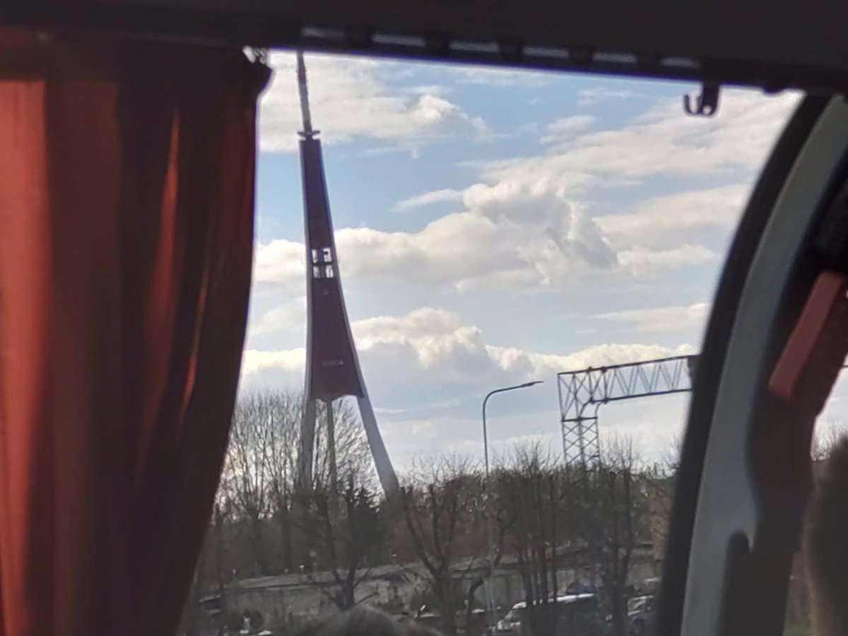 Chromed's tweet photo. Yesterday arrived to #Riga, #Latvia. Didn't see the city yet, was met by my friends and we had a lovely evening. Here is a sneak peak of a TV tower from a bus. Mobile phone photo. #notnft. https://t.co/5tzd2KYcws