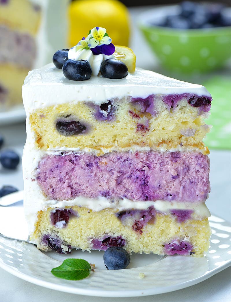 Lemon Blueberry Cheesecake Cake! recipe @ omgchocolatedesserts.com/lemon-blueberr…