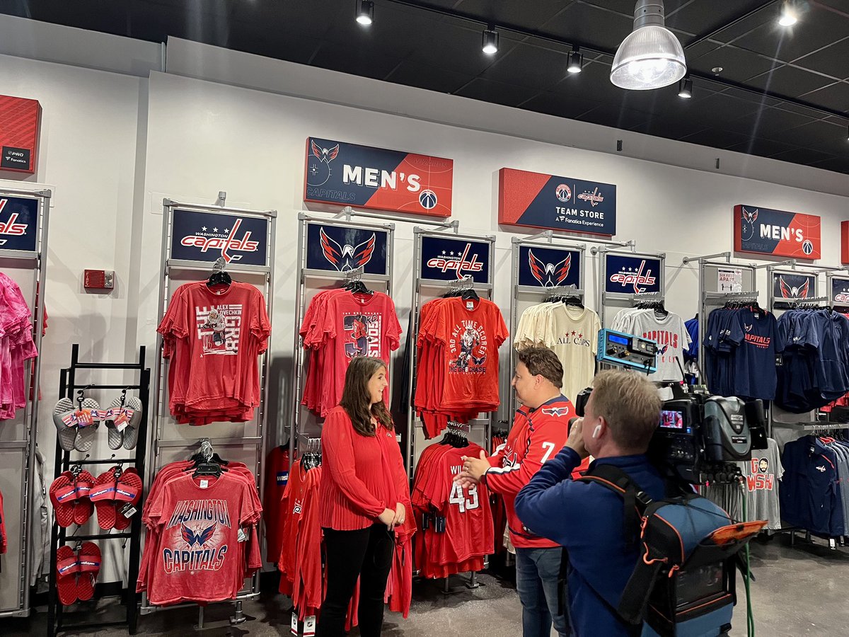 Capital One Arena team store selling Caps home and alternate jerseys with  Caesar Sportsbook ads