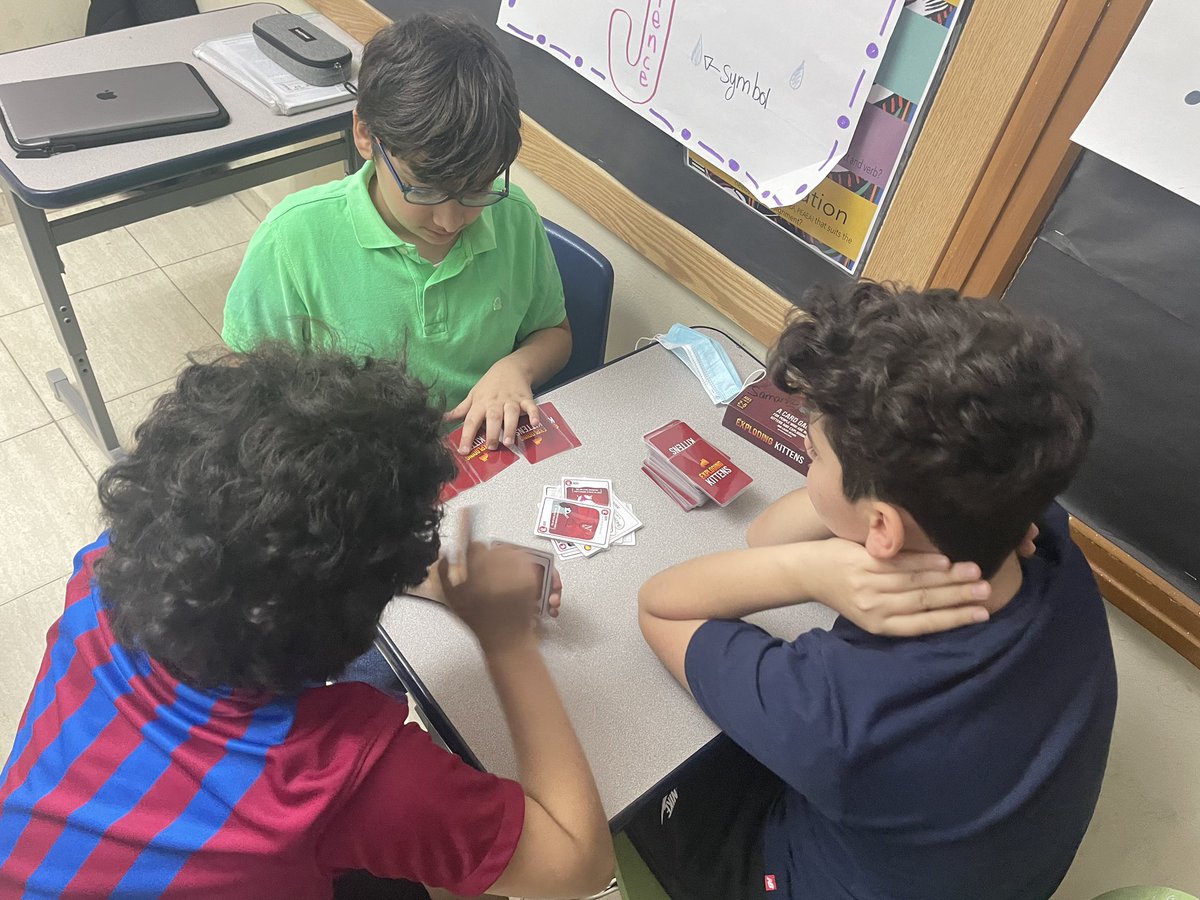 SamFles's tweet photo. Last class before EiD Holiday @AISQ8. The kids deserve to have a little fun! #Uno #Quirkle #ExplosingKittens https://t.co/sFzr7Lf9RI