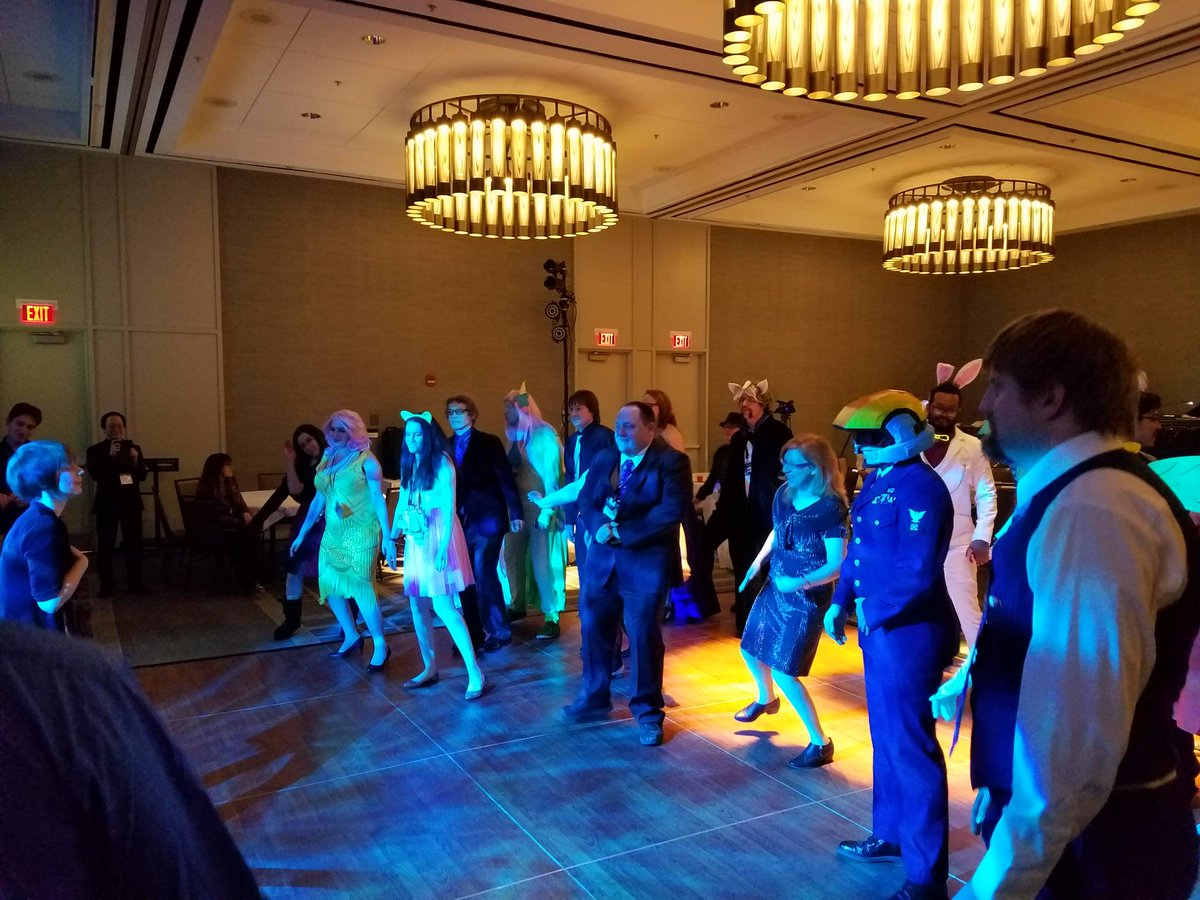 MustardMarkWCPC's tweet photo. Hey everyone!  I got picked to do today's #ThrowbackThursday!  We're going back to #WCPC18 where we had GoH @CaityBair helping before the Bass Ball giving dancing lessons to some of our attendees! https://t.co/KDuJvLLcpF