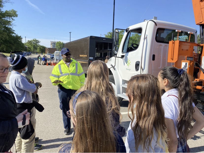 Solid Waste Service team member Lonnie Lucas was happy to take part in <a href="/WakeBoysLead/">WYMLA - Wake Young Men's Leadership Academy</a> Careers on Wheels/Truck Fair today. Thanks for having us and letting us share our love of public service! <a href="/WCPSS/">Wake County Public School System</a>