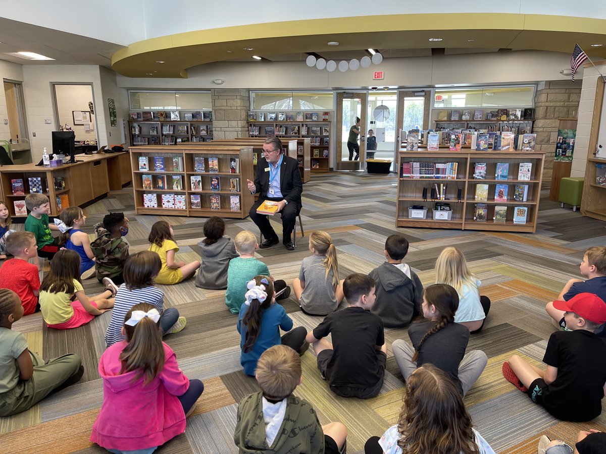 KansasTreasurer's tweet photo. It’s a great day in MHK reading to the kids of Oliver Brown Elementary about #FinancialLiteracy with the Money Bunny book series! Never hurts to meet the therapy dog either. https://t.co/PBHJovPHZe