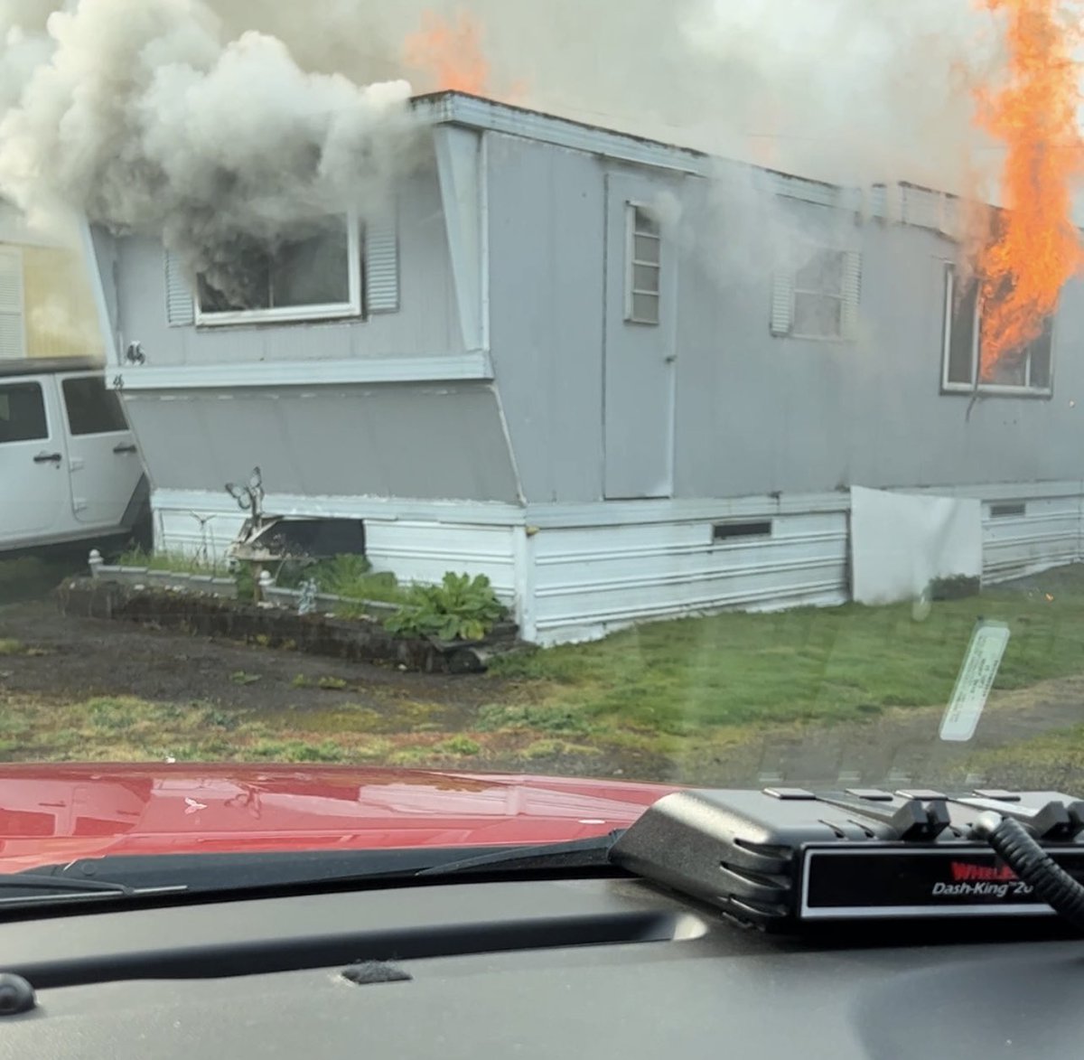 LongviewFireDep's tweet image. At the scene of a mobile home fire at 605 California Way.  No injuries and fire is now knocked down.  Crews still working with investigators on scene.