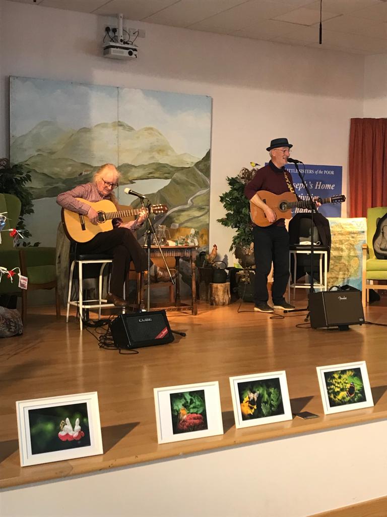 WaterfordDay's tweet photo. Liam Merriman &amp; Paul Dillon at the nursing homes of Waterford reciting poetry&amp;song for @PoetryDay_IRL 

This event was supported by @WaterfordCounci @PoetryProgRTE @rte @creativeirl @poetryireland @discovwaterford @WaterfordPocket @WaterfordArts @Deisesupes @wlrfm @WaterfordNS https://t.co/AtLq5tcSSh