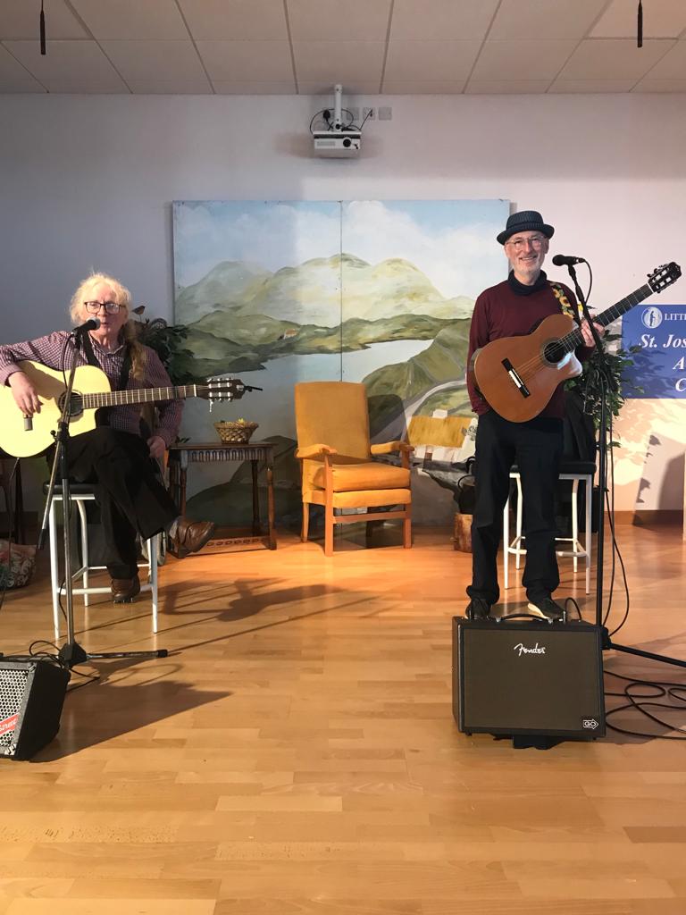WaterfordDay's tweet photo. Liam Merriman &amp; Paul Dillon at the nursing homes of Waterford reciting poetry&amp;song for @PoetryDay_IRL 

This event was supported by @WaterfordCounci @PoetryProgRTE @rte @creativeirl @poetryireland @discovwaterford @WaterfordPocket @WaterfordArts @Deisesupes @wlrfm @WaterfordNS https://t.co/AtLq5tcSSh