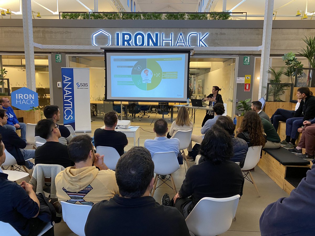 Spain_AI_'s tweet photo. Así está el #MadridAI en su vuelta a lo presencial en el @IronhackMAD 🔥🔥🔥 Amaya al micro hablando de optimización en casos reales de negocio 🦾🤓 @SASEspana https://t.co/enWEKc6eAE
