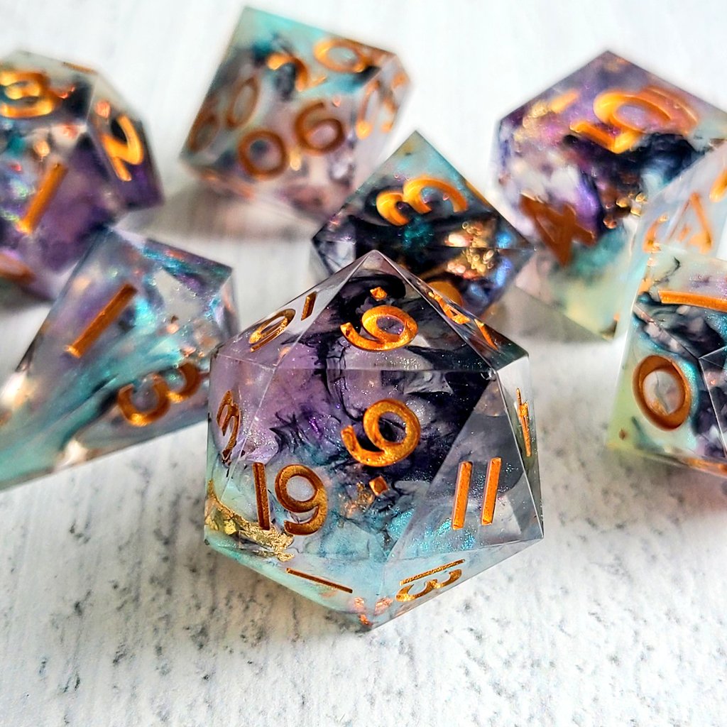 ArcaneHallows's tweet photo. One of my oldest original designs, Unraveling. This set available tomorrow. #handmadedice #DnD https://t.co/SFPIjZZLdL