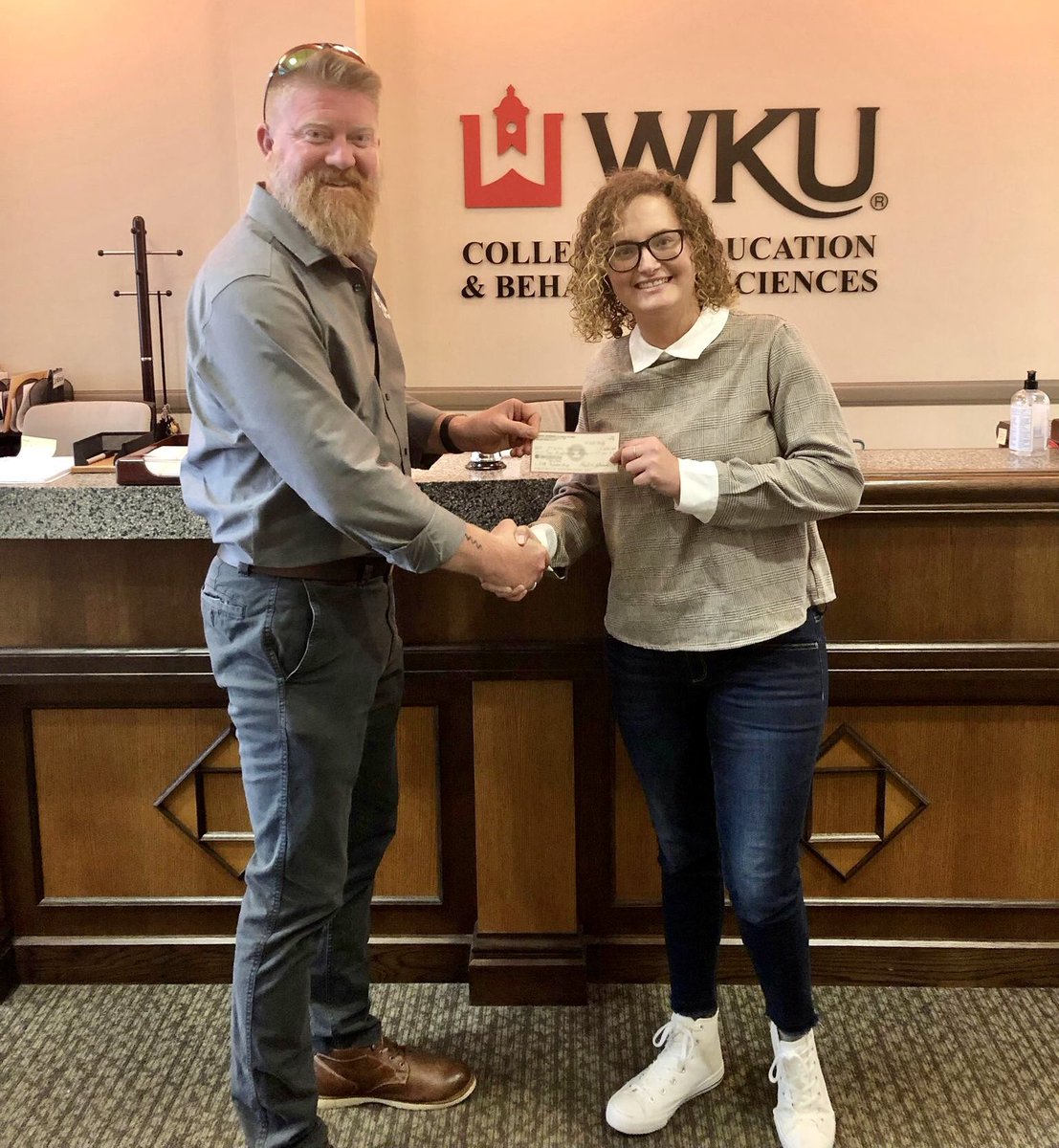 Congratulations to <a href="/WKUPsychology/">WKU Psychology</a>  student and Air Force veteran, Virginia Neighbors! She won one of the scholarships donated by #WKU alumni, retired Marine, and owner of @travelerscellar winery, Derrick Huff. We love seeing alumni giving back! Thanks Derrick! <a href="/WKUCEBS/">WKU CEBS</a>