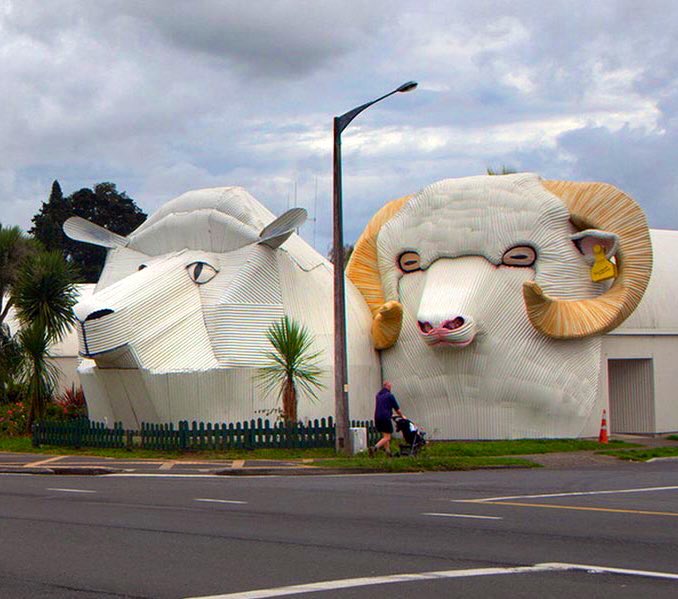 WorkingPublicHQ's tweet photo. dog, sheep, and ram buildings 
tirau, new zealand 
(henry clothier, 1990s - 2016) https://t.co/EdLkjWJoqf