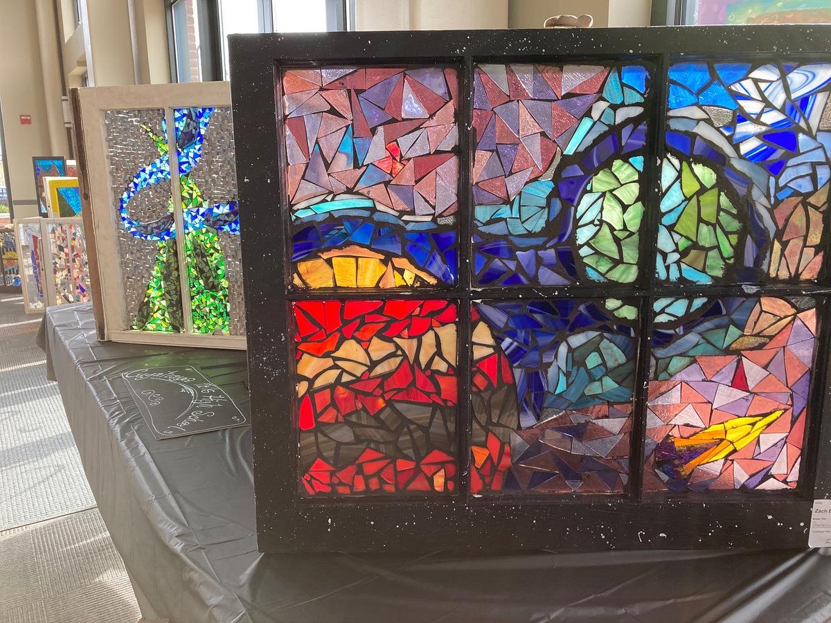 Wow! How the sun made the glass glow!! Art walk highlight: incredible glass art CFHS artists created this year 😀