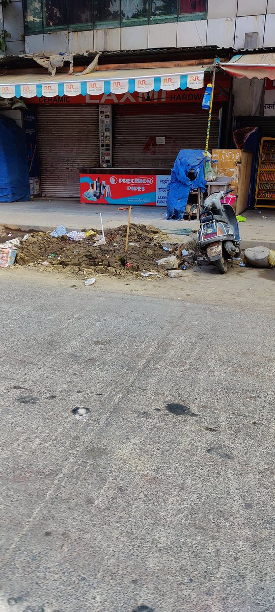 DhruvRBhatt's tweet photo. If bad roads don't break your back, perpetual dust from digging does not cause allergies, trust our @mybmc to find alternative ways for spreading misery.
Filth from gutters removed and simply kept on the street at RTO Lane to rot and smell since a week now. @mybmcwardKW https://t.co/zPwrk3nVnP