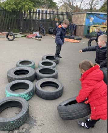 wlourladysps's tweet photo. P1/2 working together to estimate and count how many tyres are in our loose parts play area. They used their problem solving skills and decided it would be best to make lots of big 10 frames and skip count π#wlnumeracy #outdoorlearning https://t.co/ieJRAHBNw3