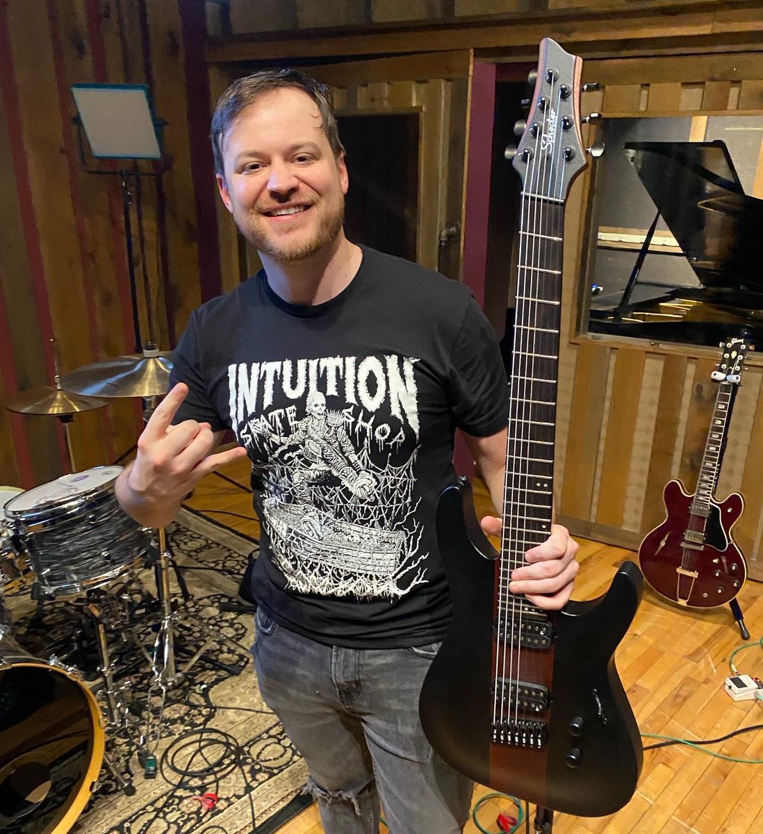 Intuitionskate's tweet photo. ⚰️Intuition x @RobScallon shirt premieres at #BladingCup 🏆! Check the Intuition booth // Sizes XS - 3XL // Original artwork by #JeremyBeightol. 🎸Rob is a renowned guitar player, and Intuition is stoked to introduce his audience to rollerblading and ours to guitars! #robscallon https://t.co/4XtDgdaj1c
