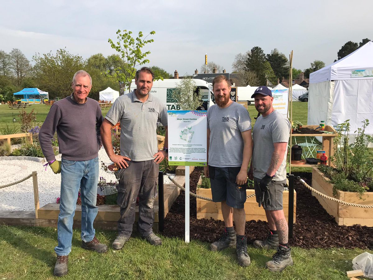 OSTCharity's tweet photo. #HopeStreet Garden at BBC Gardeners' World #SpringFair is ready🌺! Huge thanks to Tim, Martin, Eliot and Rob from Tab Landscapes for all their hard work. Please visit from today - 1 May. Info here➡️https://t.co/x5dWj3AKh7 #BBCGWSpringFair #GardenInspiration #Traumainformeddesign https://t.co/INKS30nqsE
