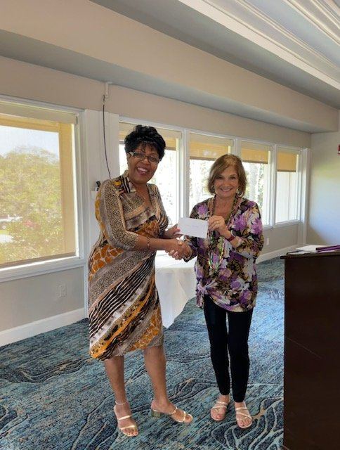 New_LifeMission's tweet photo. Neighbors of Suntree made a generous donation to New Life Mission towards supporting the needs of Kids Academy. Our beloved volunteer,  Joann Nesbeth was at their luncheon to accept the check on behalf of New Life Mission. THANK YOU! https://t.co/Z1WECYJH0A