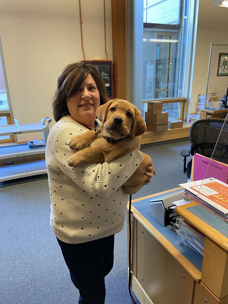 What better way to start your day?! Mrs. Finigan gets a bit of love from Officer Rusty as we honor the best Administrative Assistant!