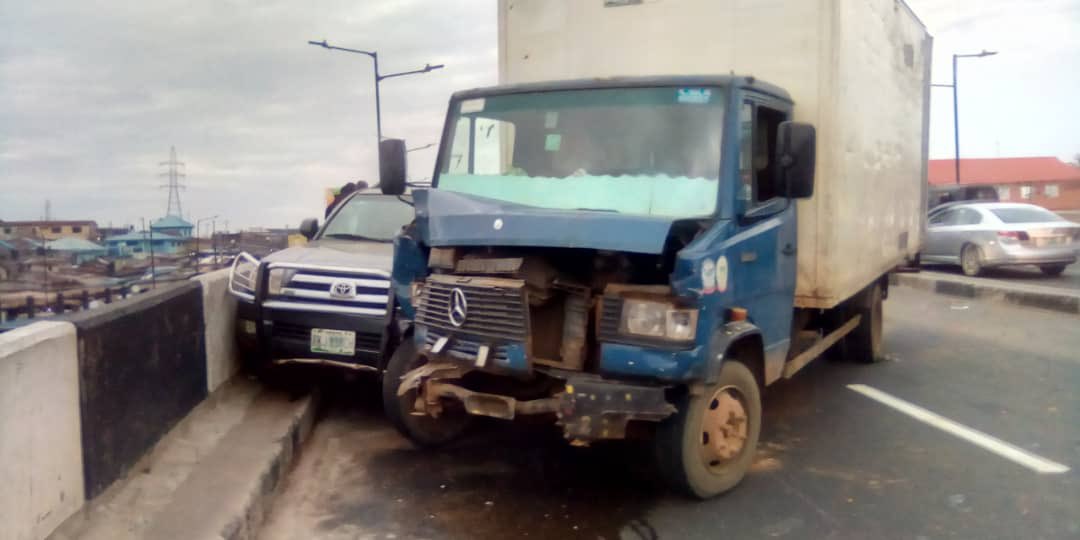 trafficbutter's tweet photo. VIA @followlastma: [6:10PM] #Mile12 #AccidentReportReport of a serious accident just occurred on Mile 12 bridge inward Owode Elede. The accident involved three vehicles. A truck, Toyota 4 runner and a Nissan Sentra. https://t.co/TuP2d6b2DJ