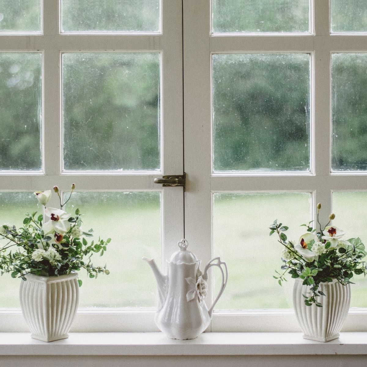 Triple-track windows in older homes have small drains to prevent flooding. Make sure no rain stays trapped there after a storm, as this can rot your wooden sills. 💧 #HomeMaintenance