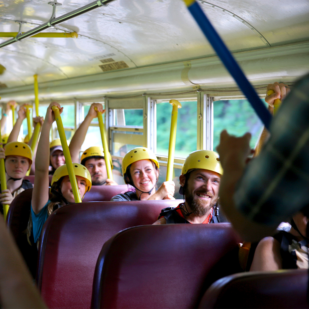 The anticipation that builds on the bus ride to the river never gets old. ✨ Have you ever taken a trip on one of our buses before?